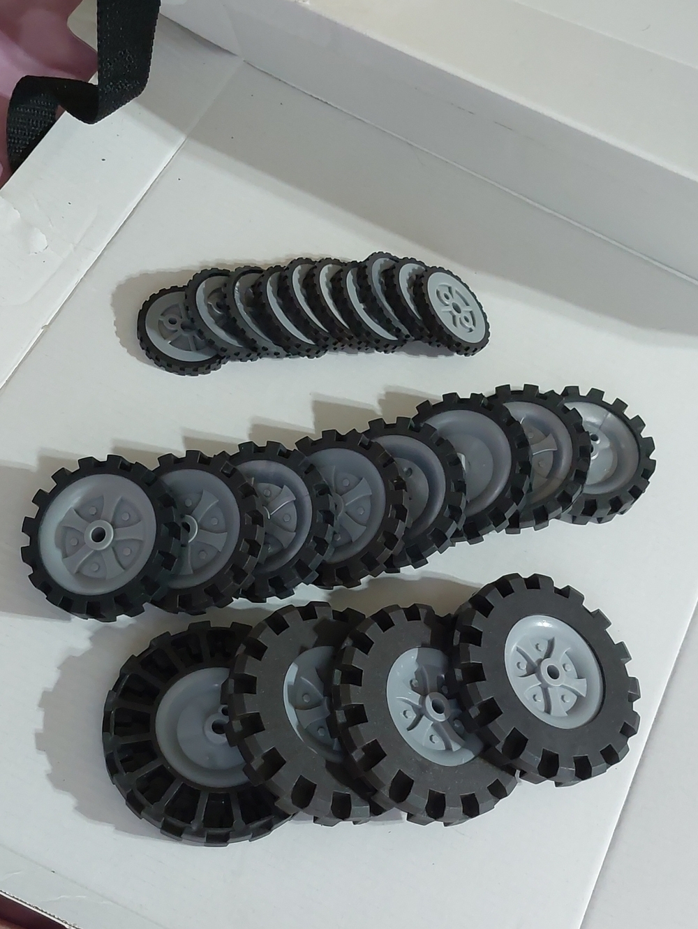 Set of 22 Black and Gray Knex Wheels In Three Different Sizes